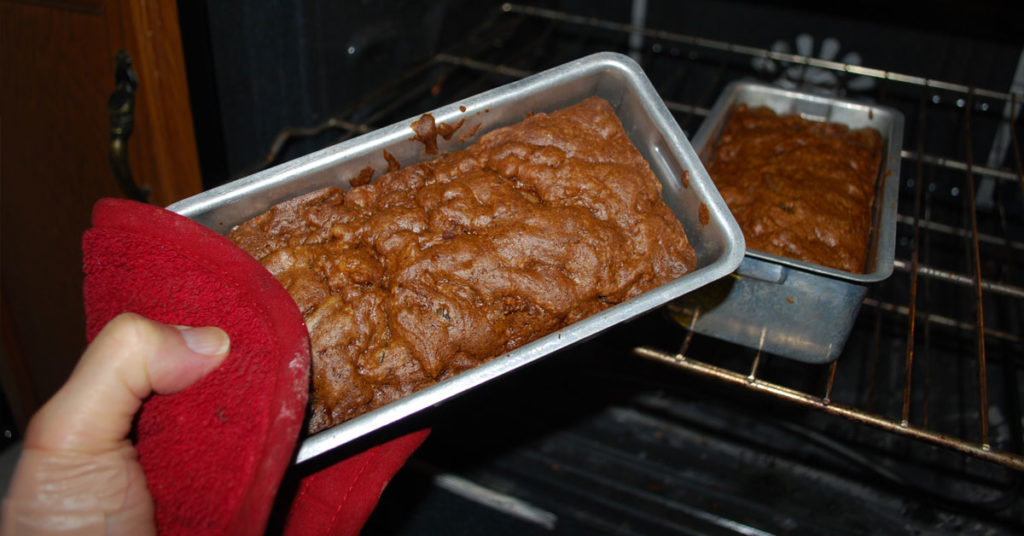 An image of persimmon bread in an oven