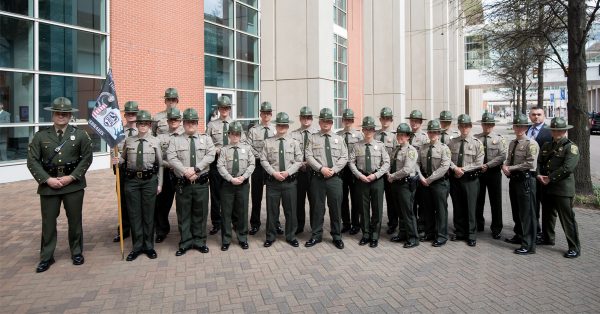 An image of a graduating class of conservation police officers