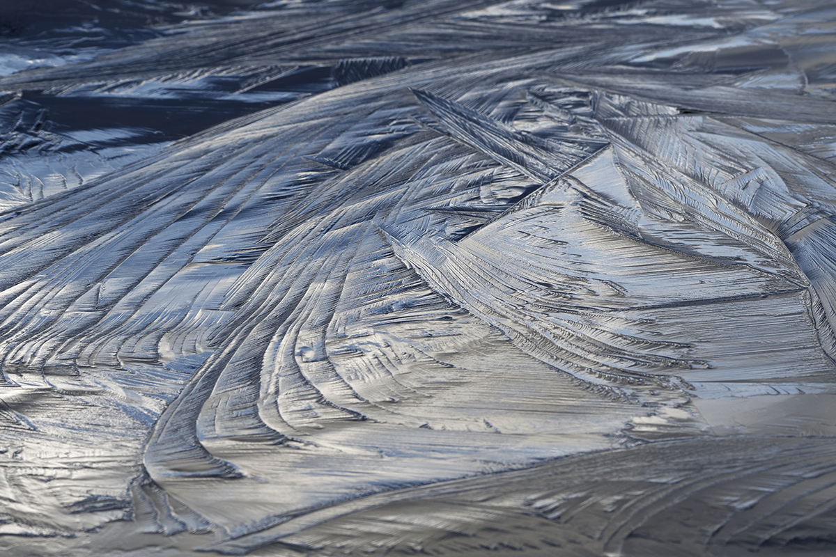 A close up image of ice showing it's currents and details