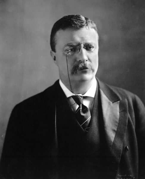 A black and white picture of former President Theodore Roosevelt