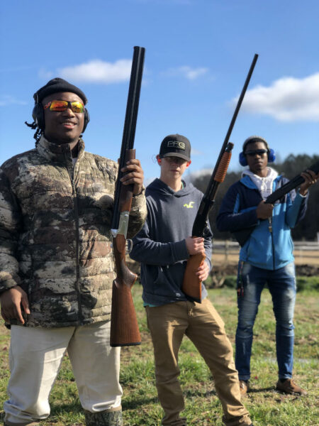 I took (from left) Justin Wilson, Dylan Jones, and Na-Shawn Green to the range to teach them to shoot clays before they started bird hunting.