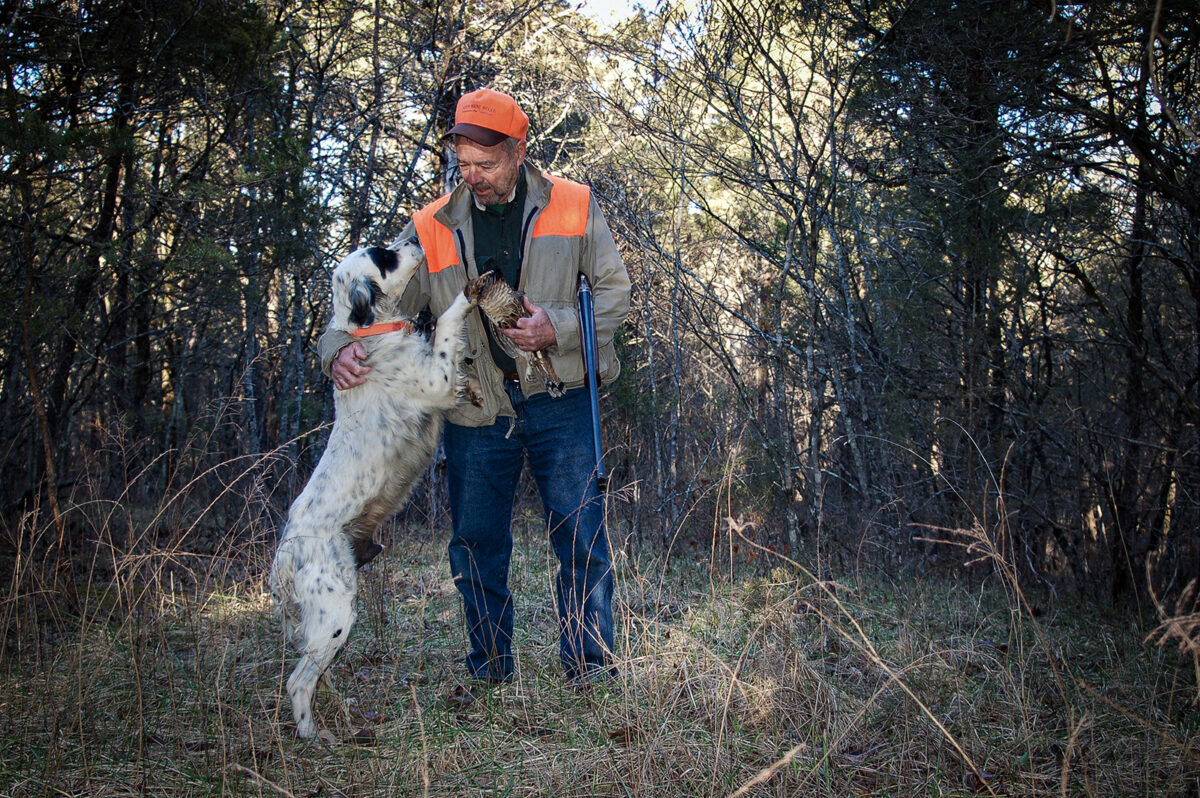 An image of the late Jack Leffel and his dog after a successful grouse hunting trip