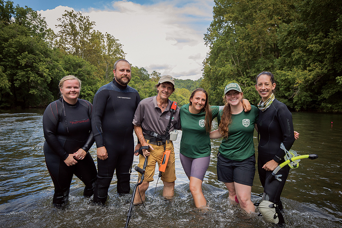 An image of the team for Monkeyface mussel reintroduction taken in the Clinch River after the reintroduction process occurred 