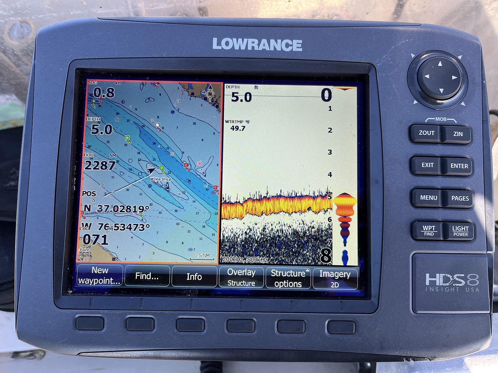 A photo of a boat's fishfinder showing shallow water depth.