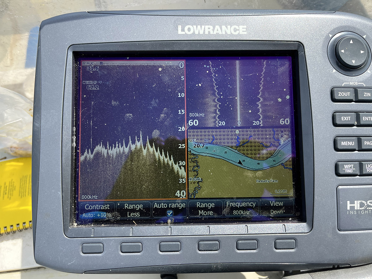 An image of a LOWRANCE sonar system depicting the jagged river bottom in high current areas