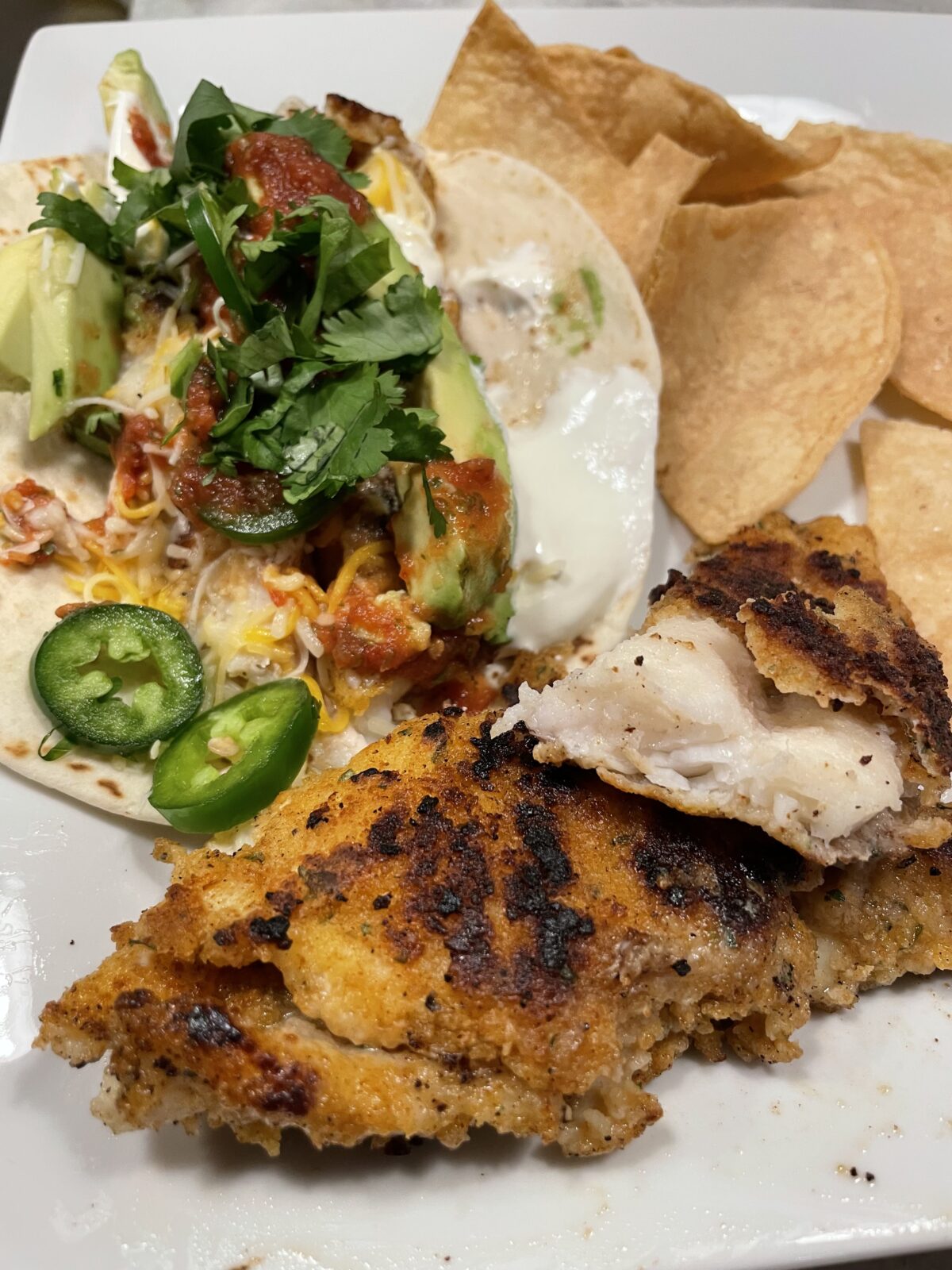 An image of a fried blue catfish taco on a plate