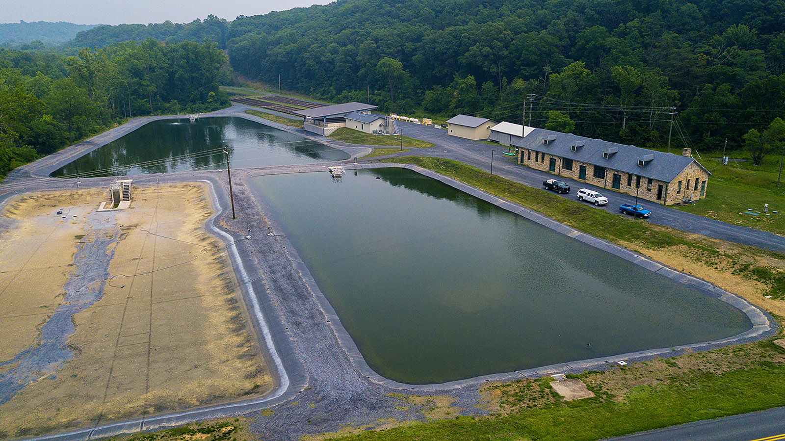A aerial view reveals the Front Royal hatchery's newly lined rearing ponds and new buildings for concrete raceways and hatchery.