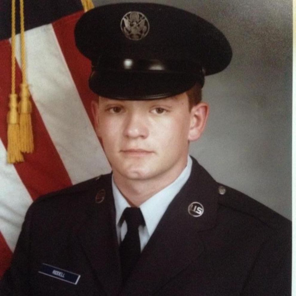 An older photo of a young man in an Air Force uniform.