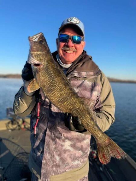 An angler holding a fish